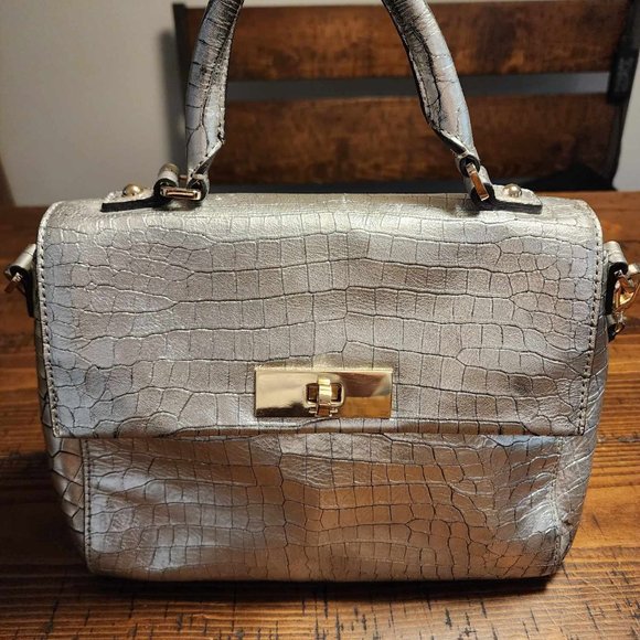 kate spade Handbags - Kate Spade Silver Purse